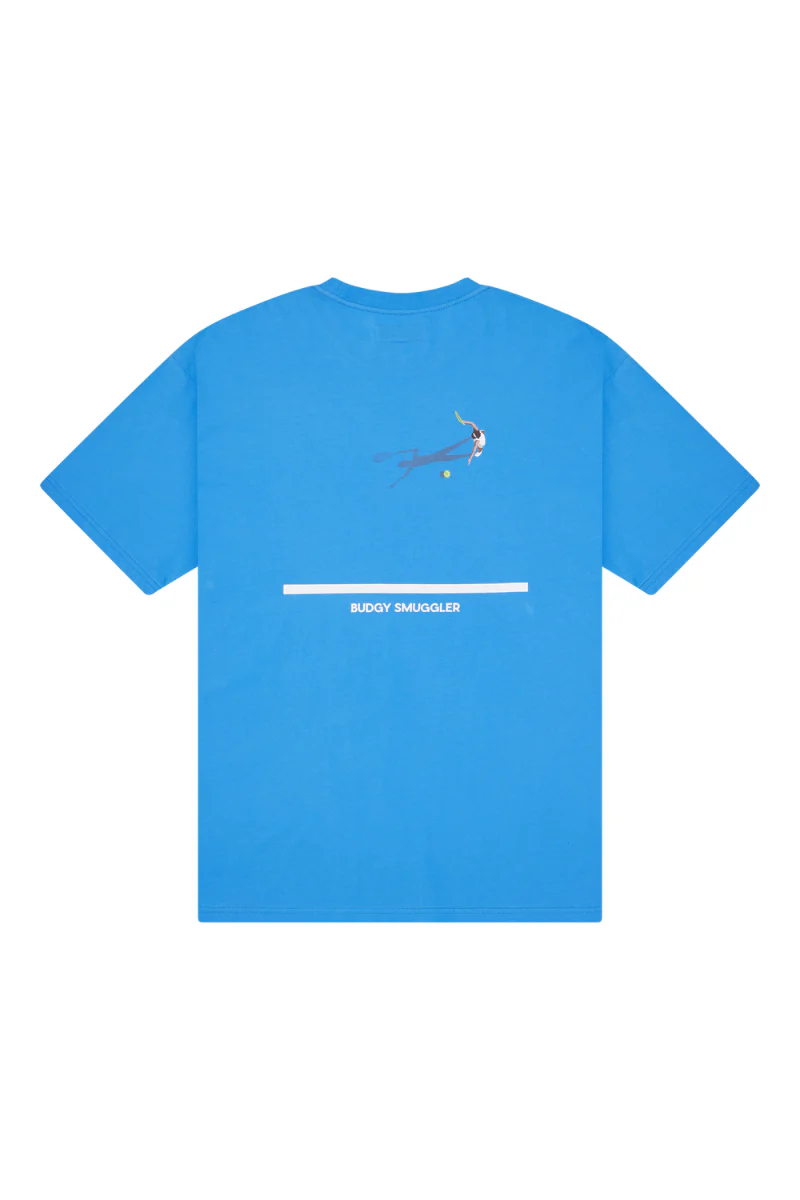 Lightweight Blue Tee in Tennis Court - Image 4